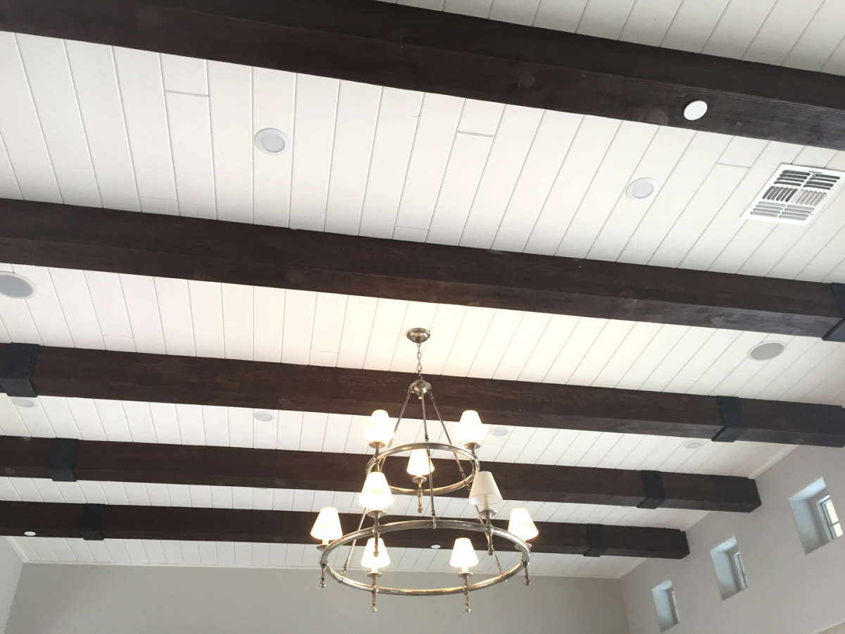 painted wood paneling on ceiling