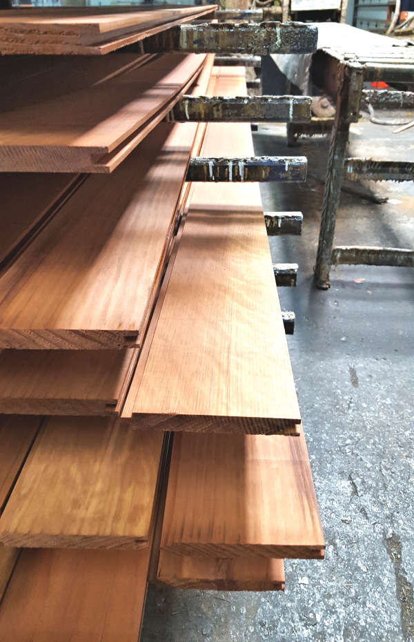 Redwood Siding siding T&G SAP B Near Clear Grade Factory Pre-Stained Olympic 717 redwood on Mill Drying Rack